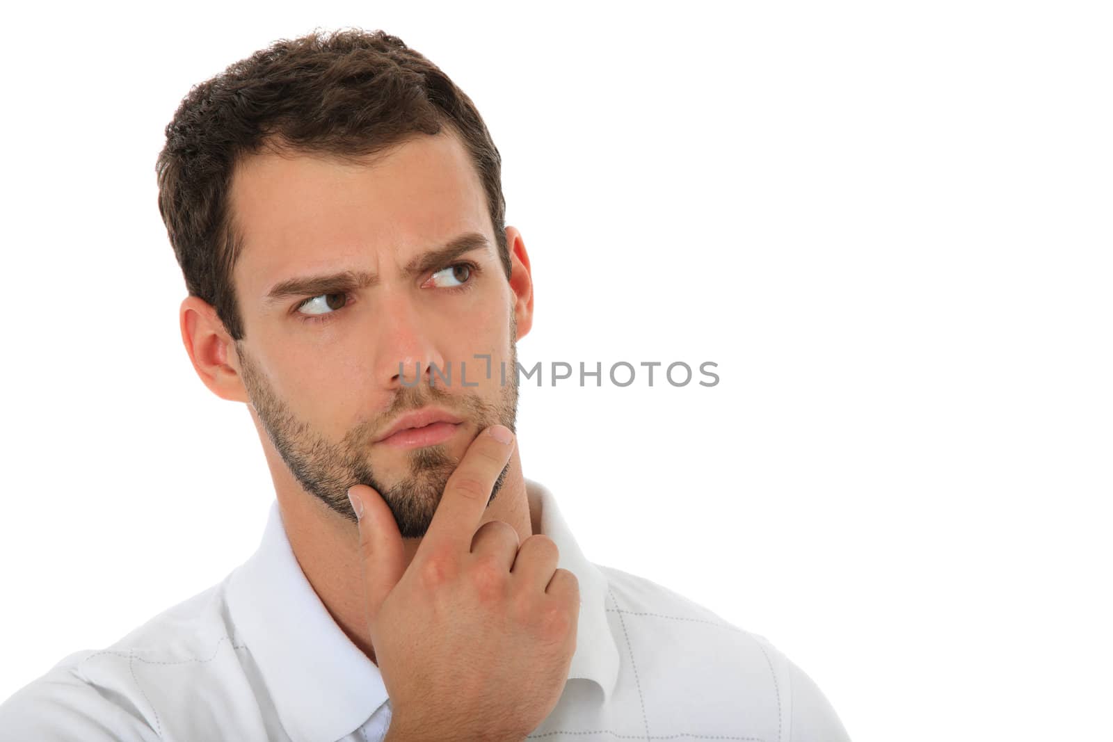 Young guy deliberates a decision. All on white background.