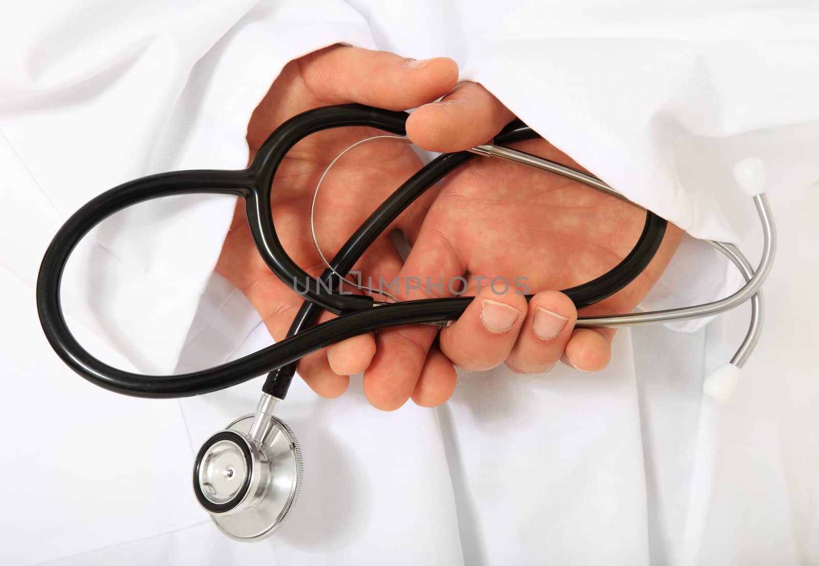 Doctor holding stethoscope.