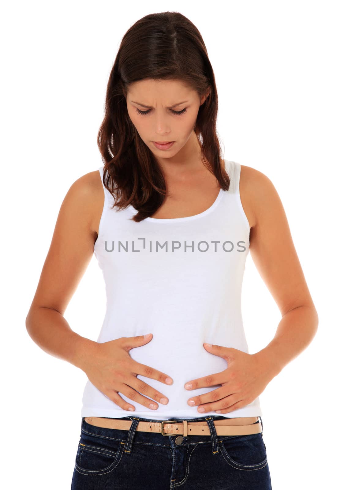 Attractive young woman suffers from stomachache. All on white background.
