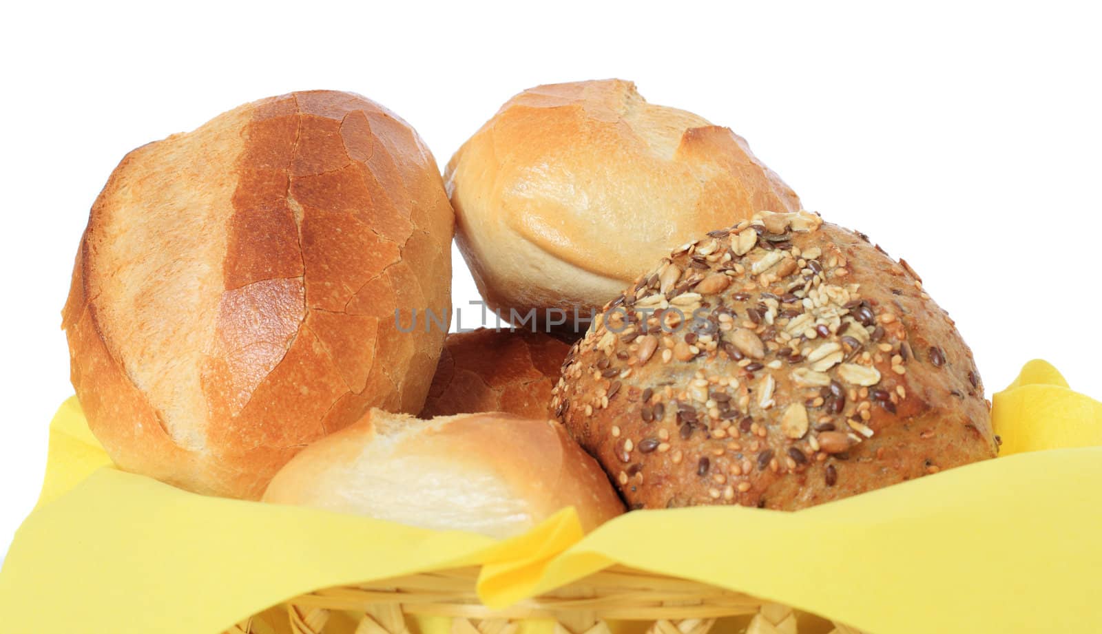 Fresh rolls in a basket. All on white background.