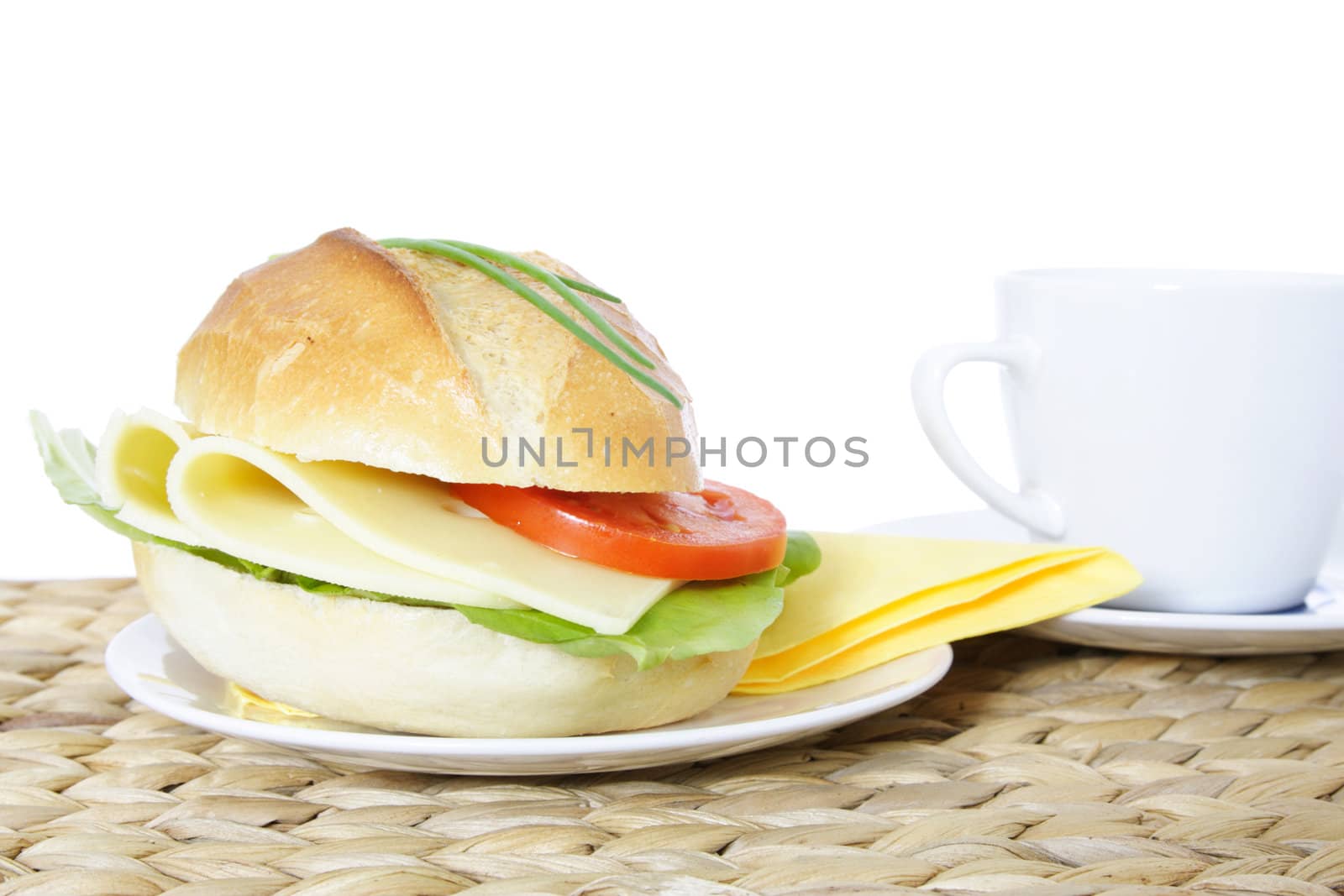 Fresh made roll with cheese. All on white background.