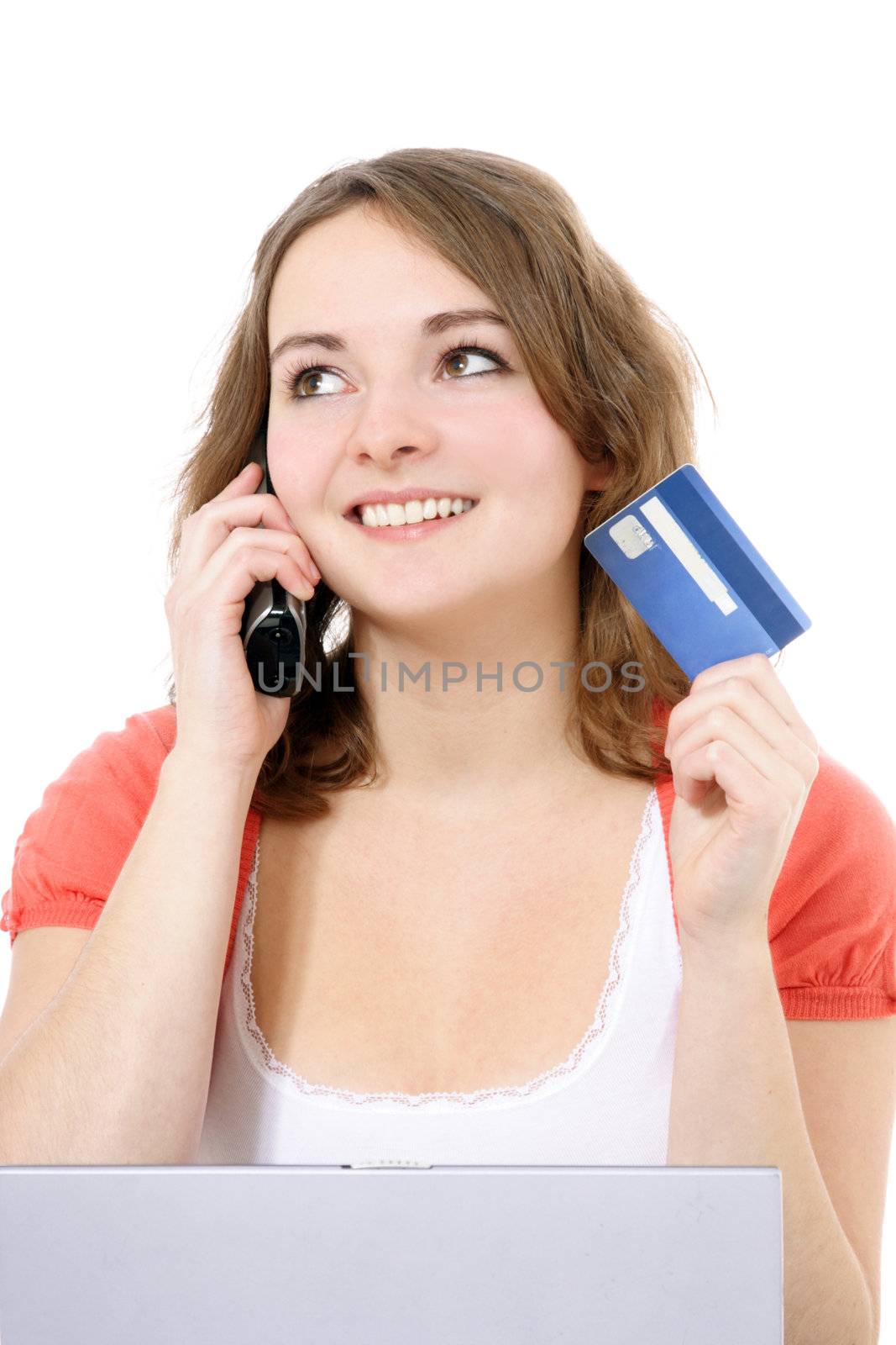 Attractive young woman during online shopping. All on white background.