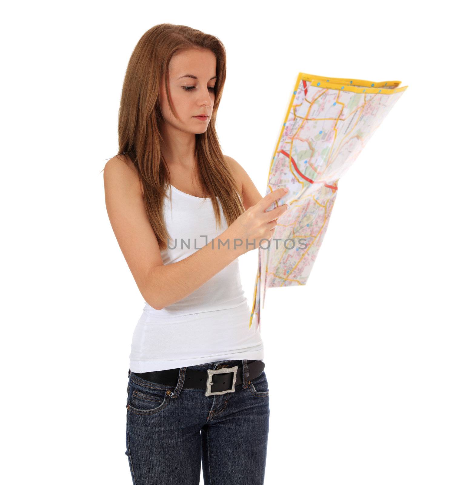 Attractive girl tries to find her way on a map. All on white background.
