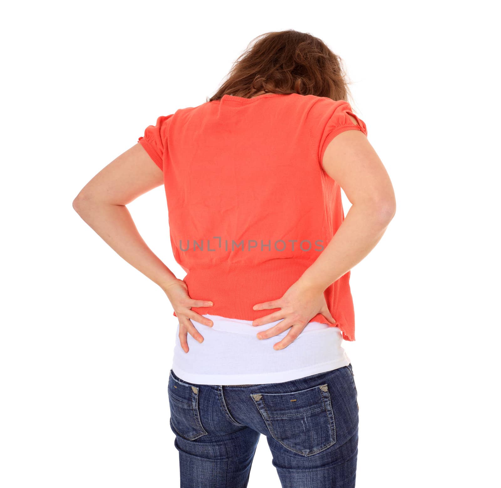 Attractive young woman suffering from back pain. All on white background.