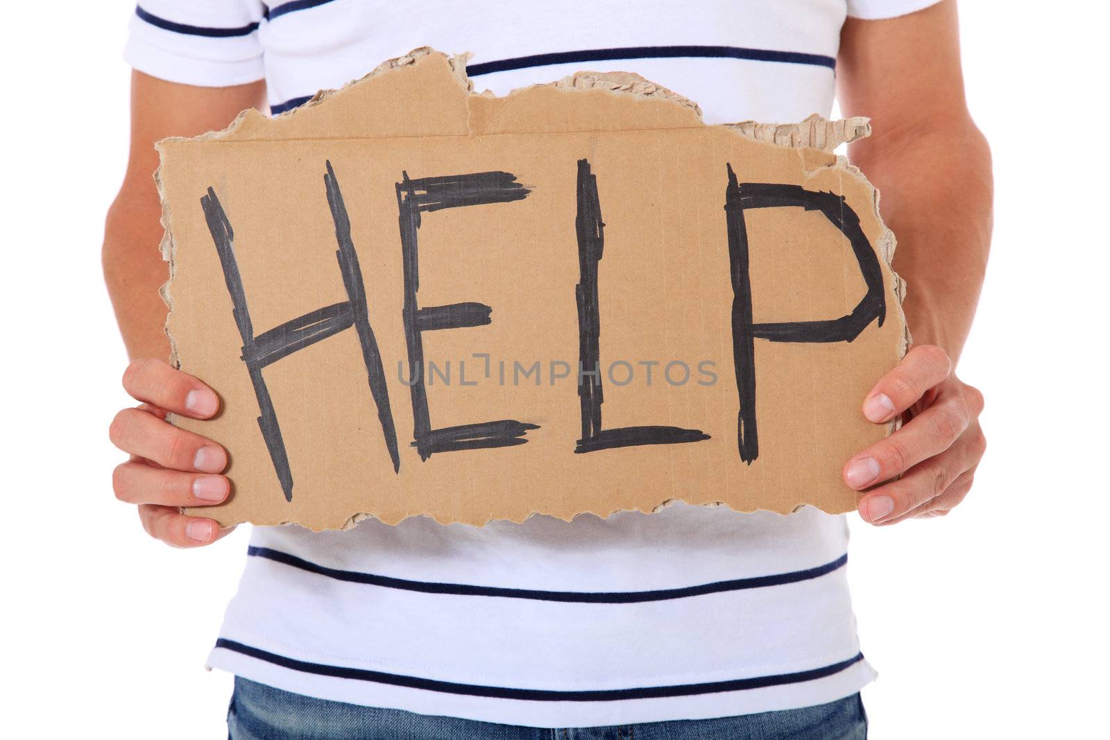 Male hand holding cardboard sign with the term help. All on white background.