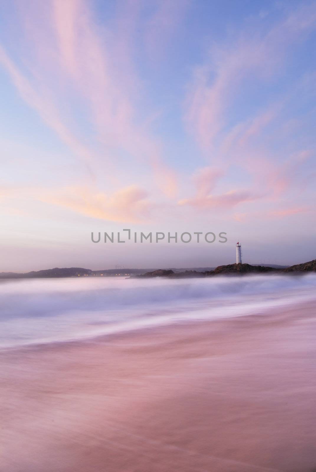 Slow shutter seascape. Northern Spain, view to lighthouse.