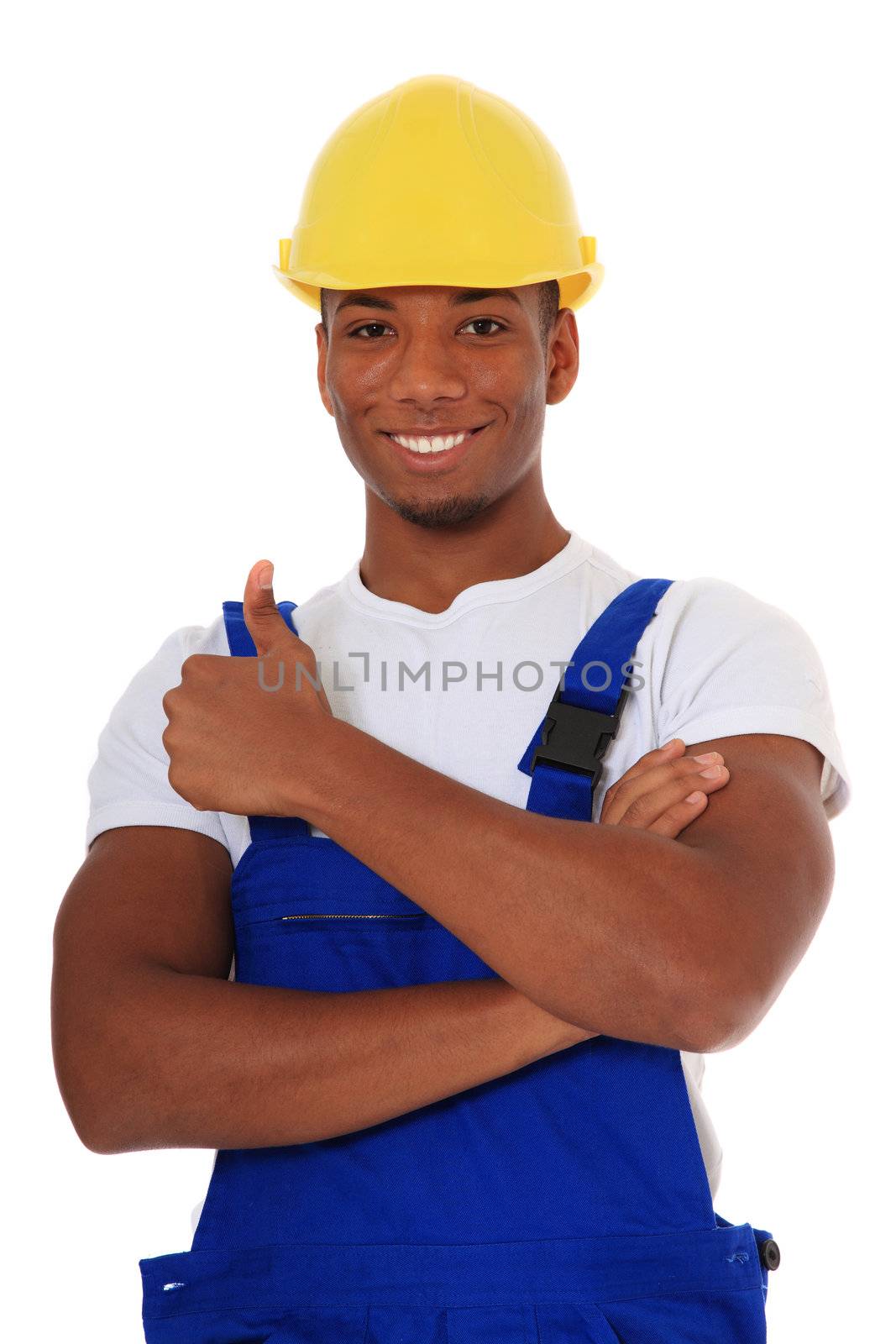 Attractive black manual worker showing thumb up. All on white background.