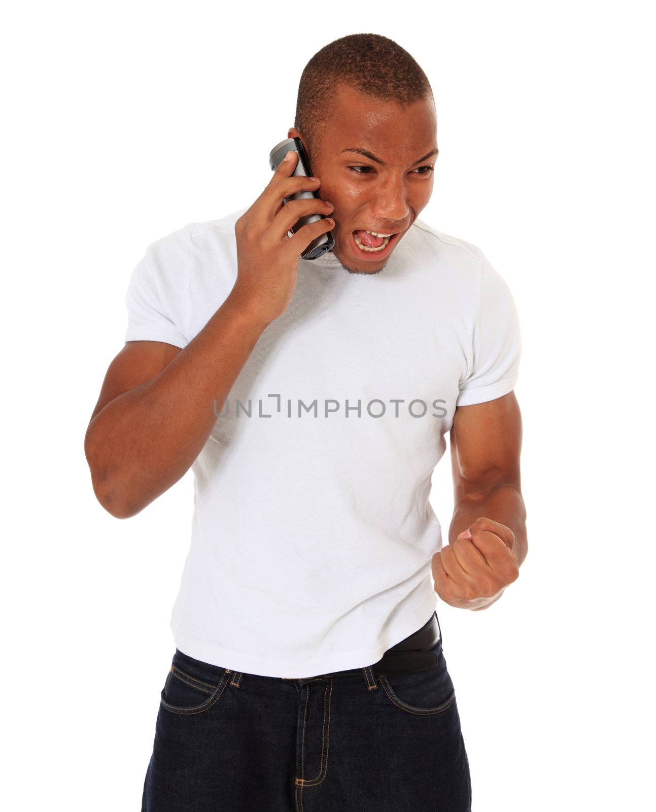 Attractive black man being angry during phone call. All on white background.
