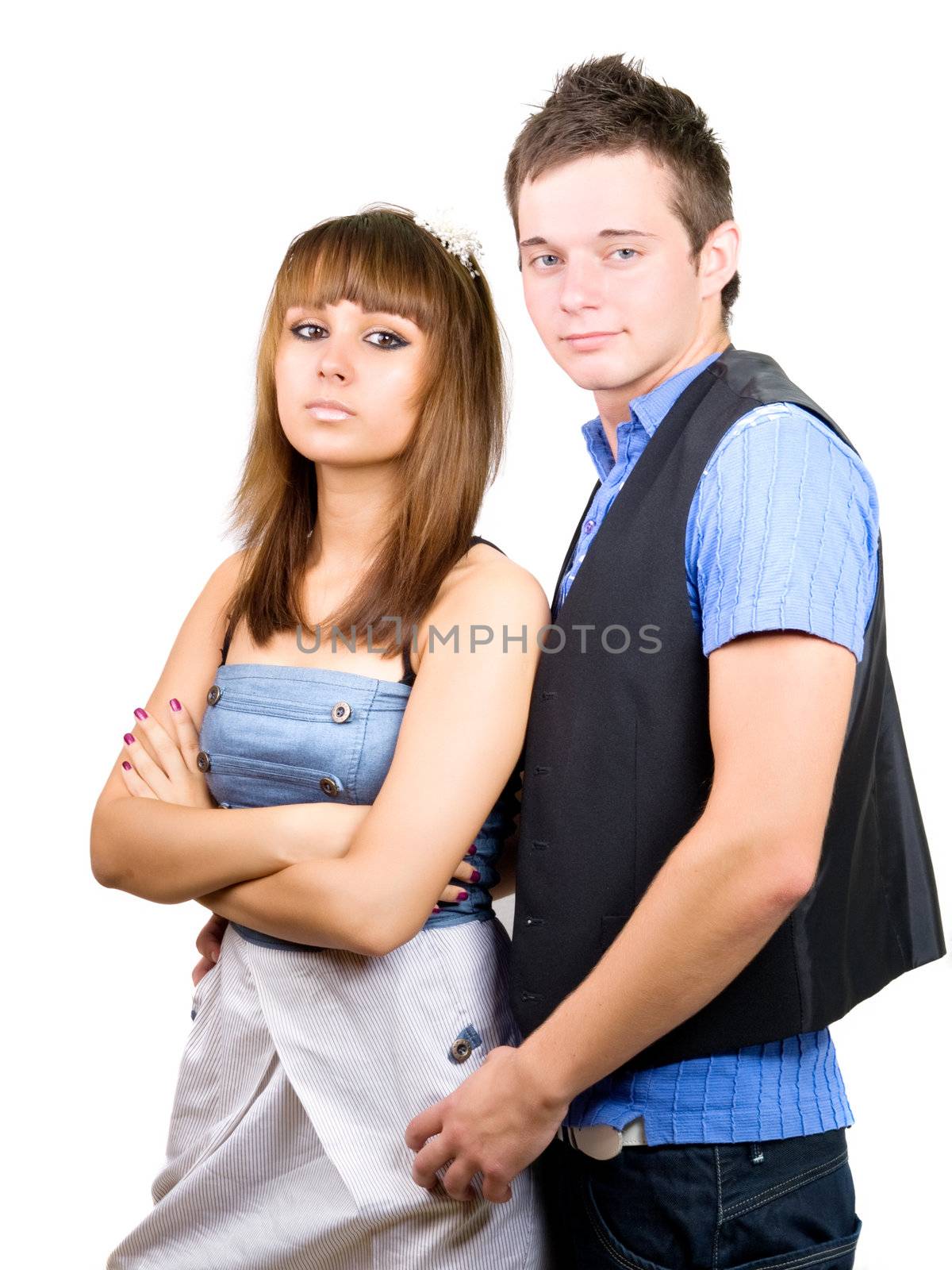 Portrait of a young handsome couple. Young man embraces woman. by motorolka
