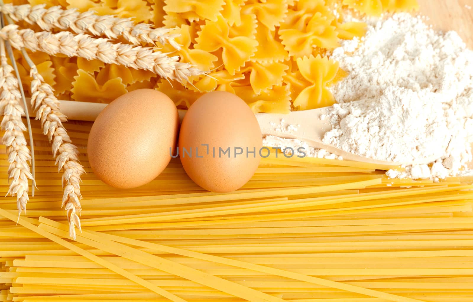 Food background: macaroni, spagetti, egg, flour, wheat 