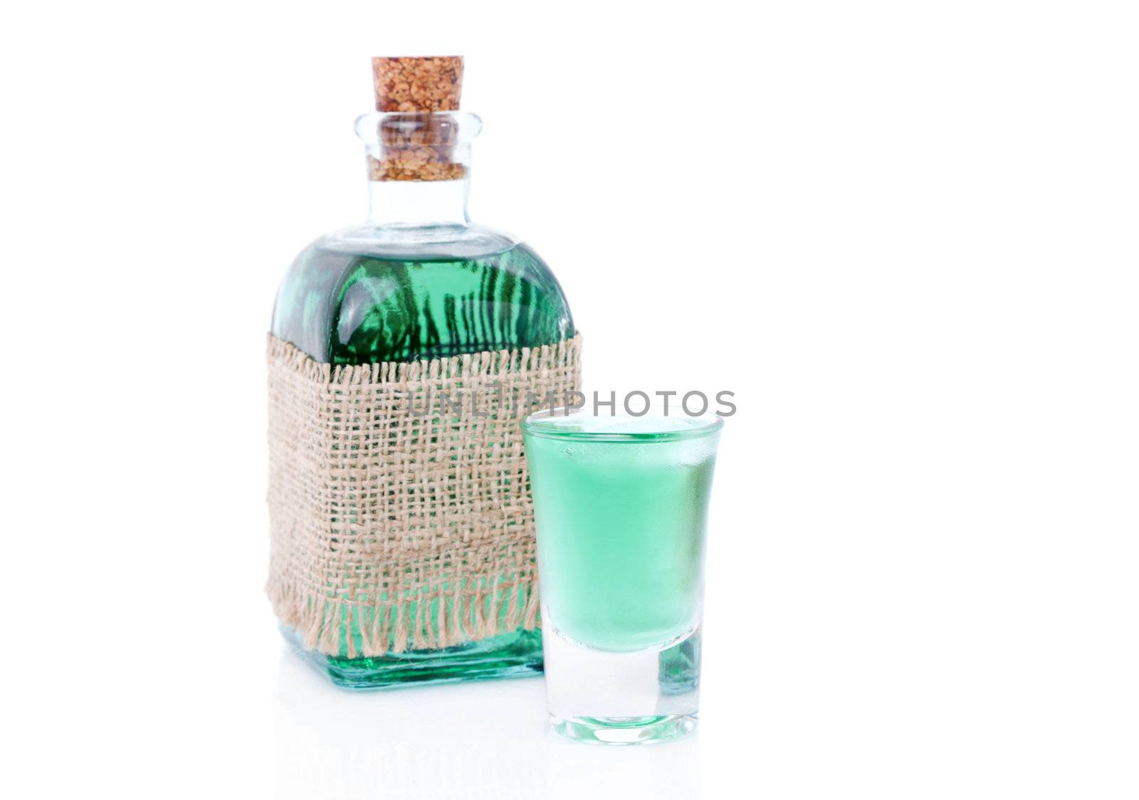 glass of  liqueur / mint drink and bottle 
