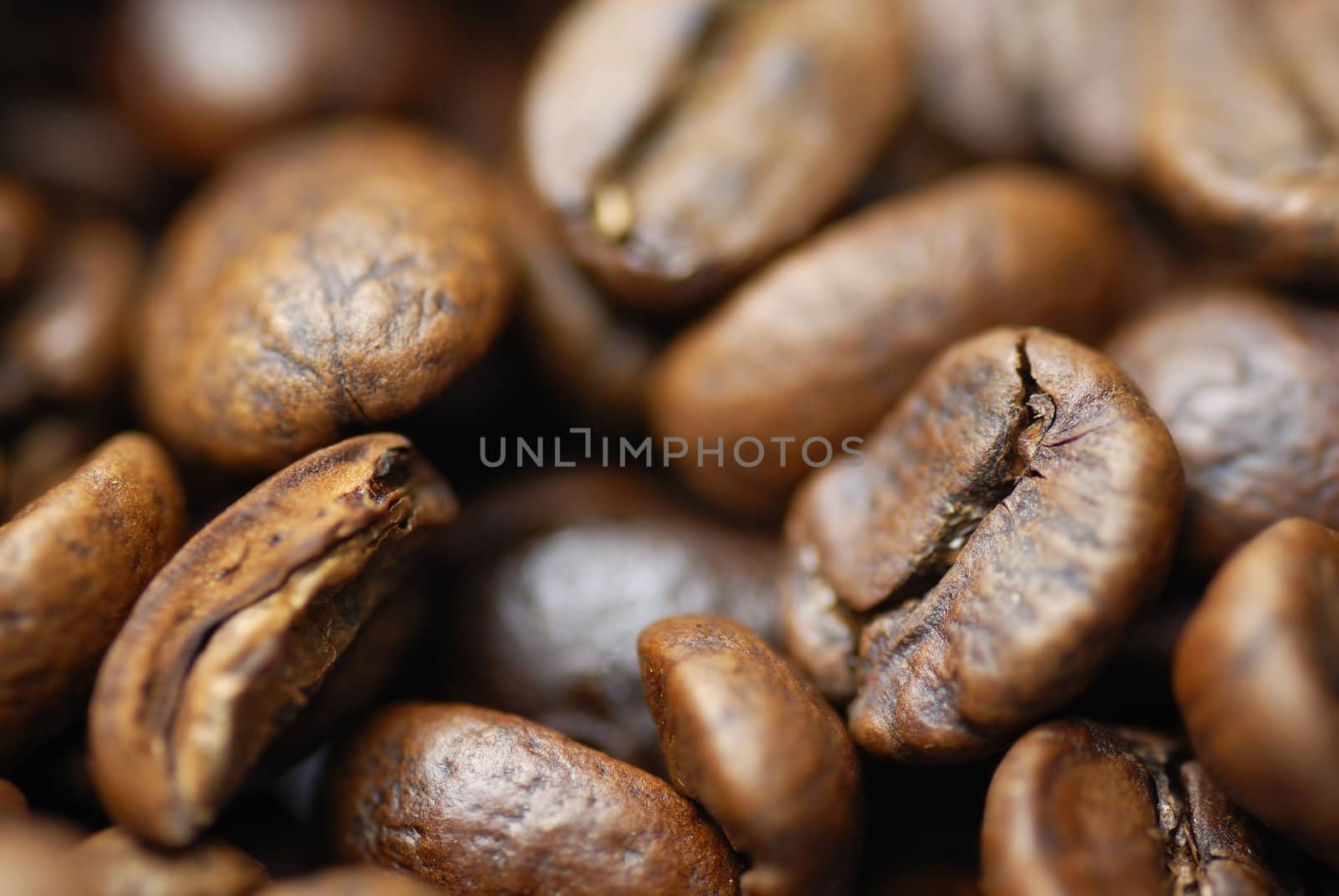 Macro image of decaffinated coffee beans.