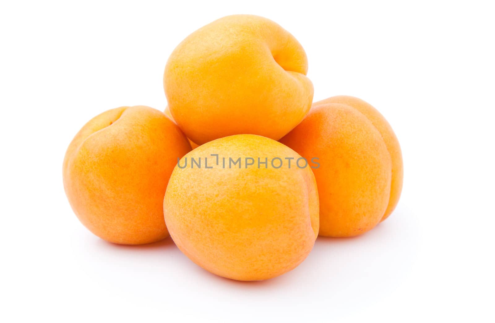 Apricots isolated on a white background  by motorolka
