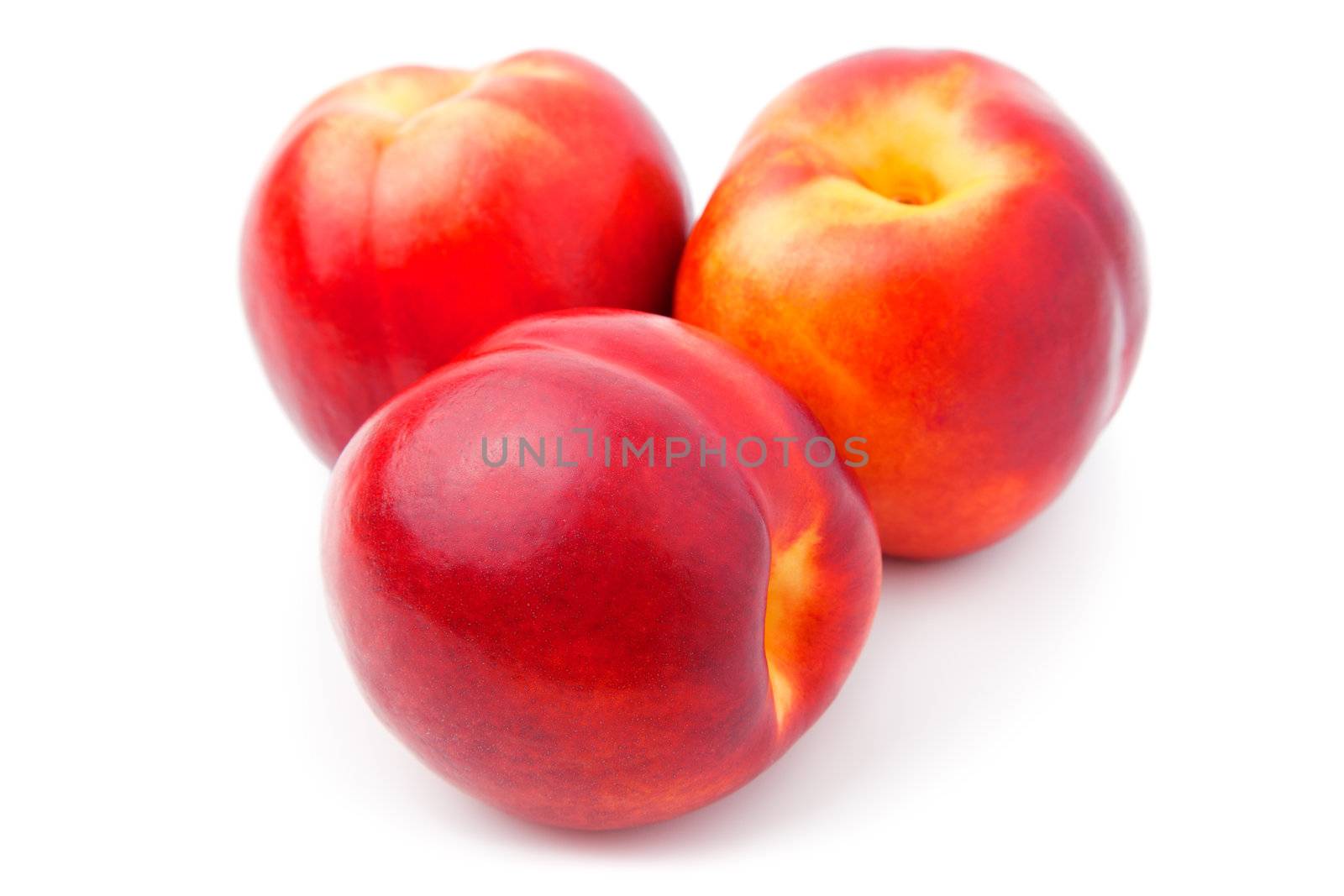 Ripe peach on a white background  by motorolka