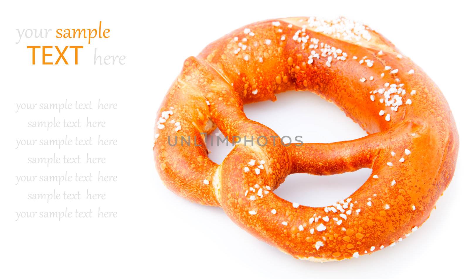 fresh German pretzel (Bretzel) with salt, with copy space. by motorolka