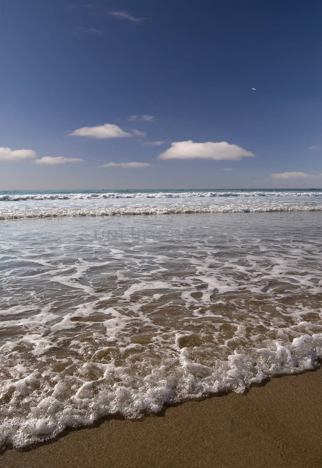 Sunny beach scene from Cornwall, UK.