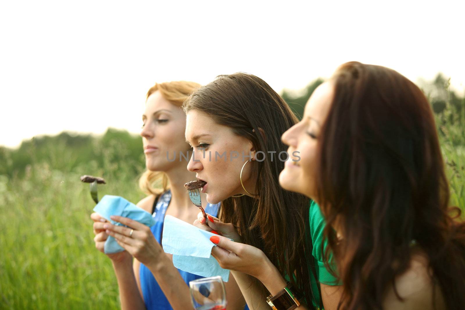girl drink wine on nature background