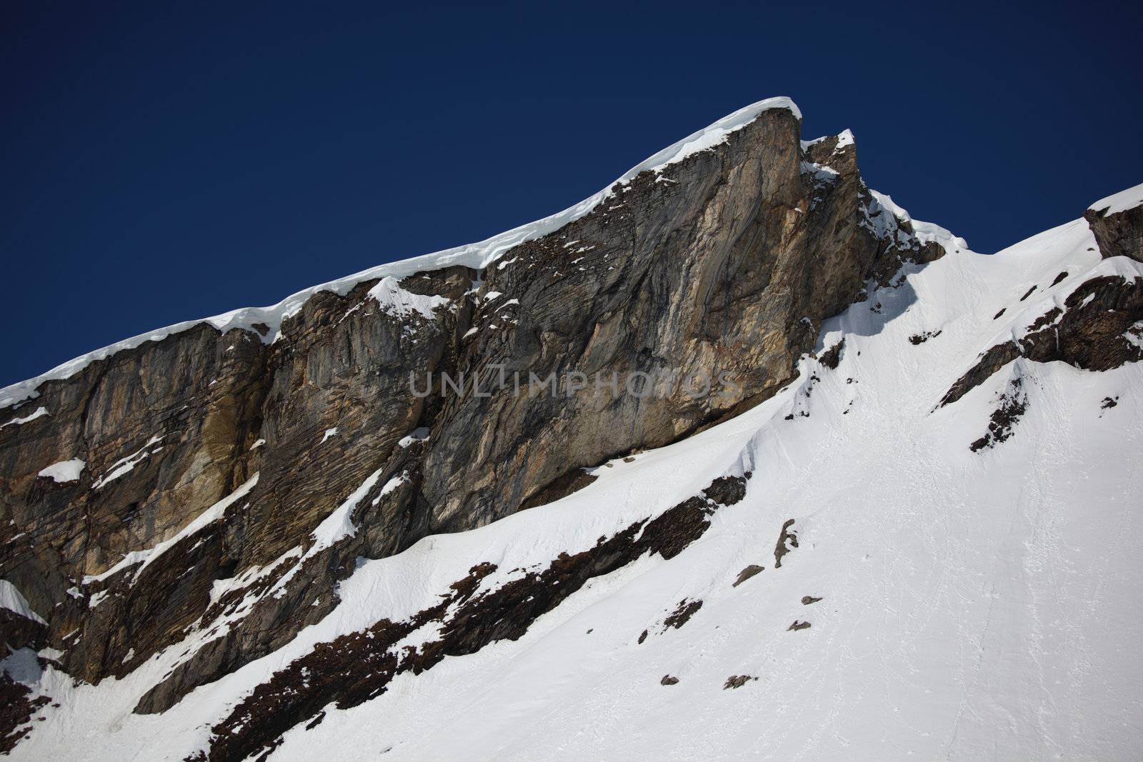 top of mountains in blue sky