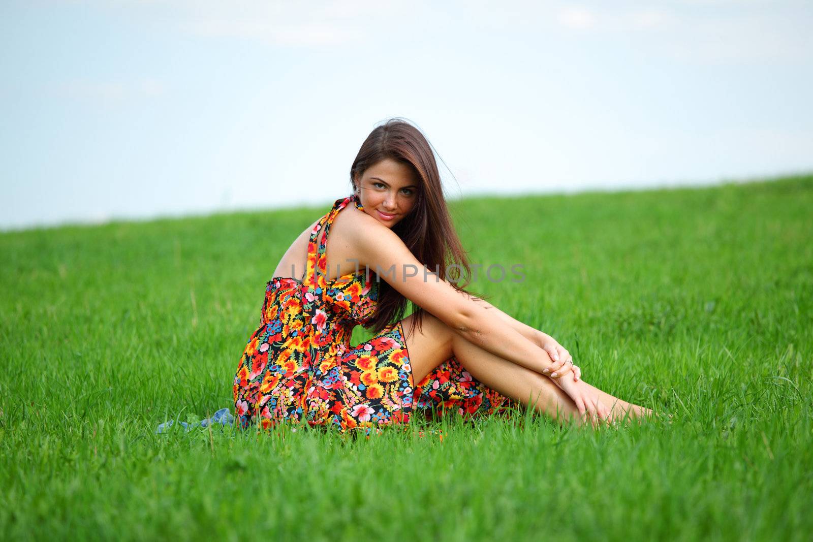 happy woman on green grass 