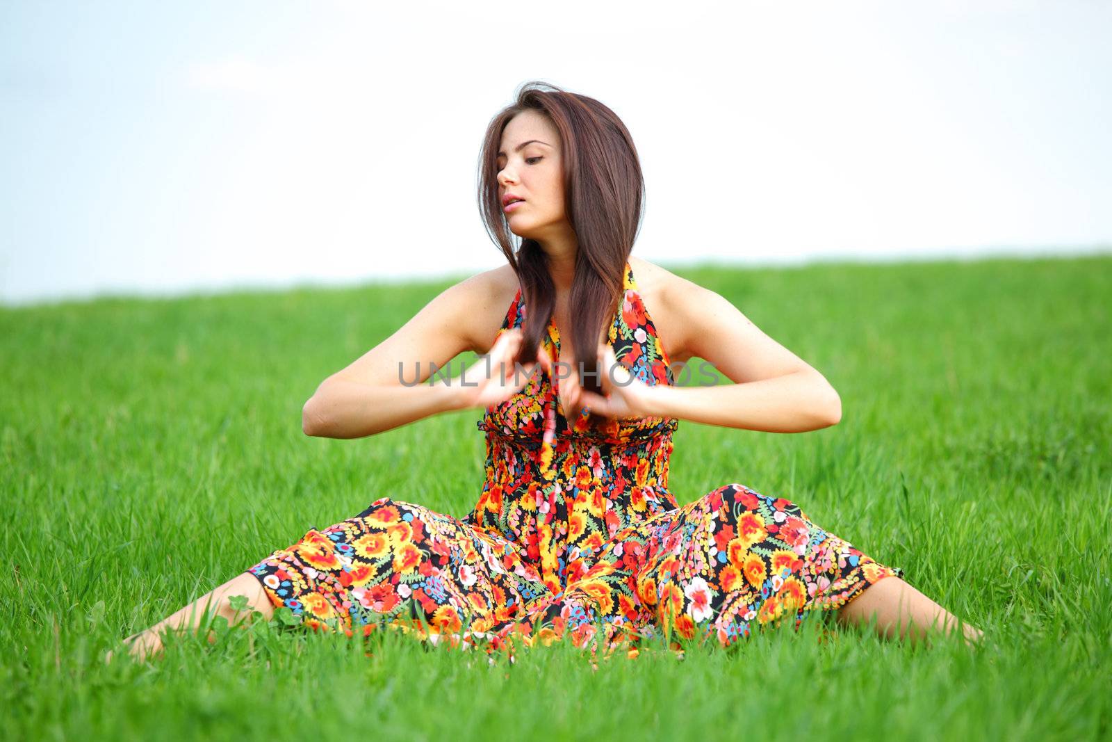 happy woman on green grass 