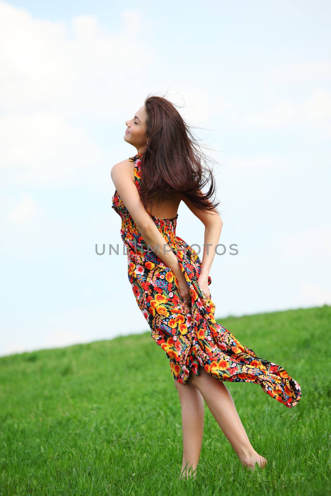 happy woman on green grass 