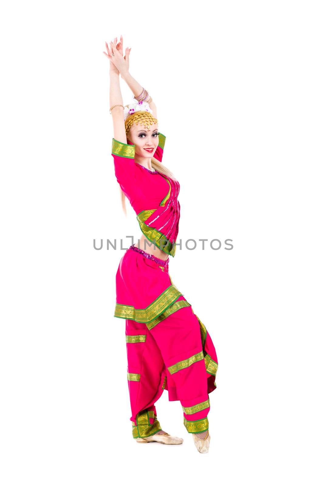 full length portrait of indian woman dancing in studio.  Isolated on white background.