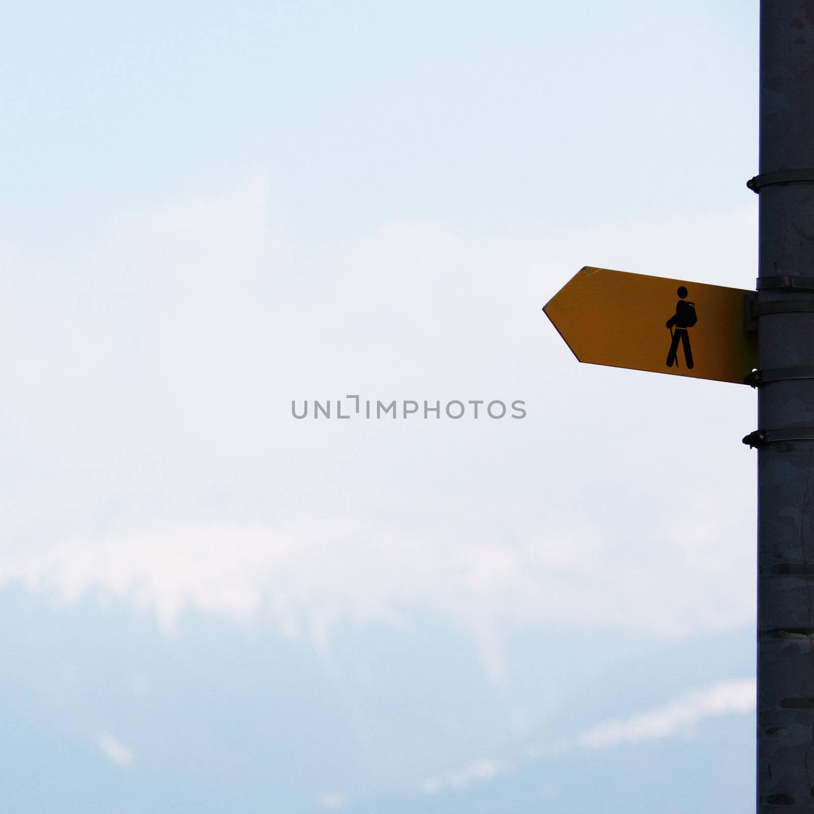 sign mountains sun in blue sky