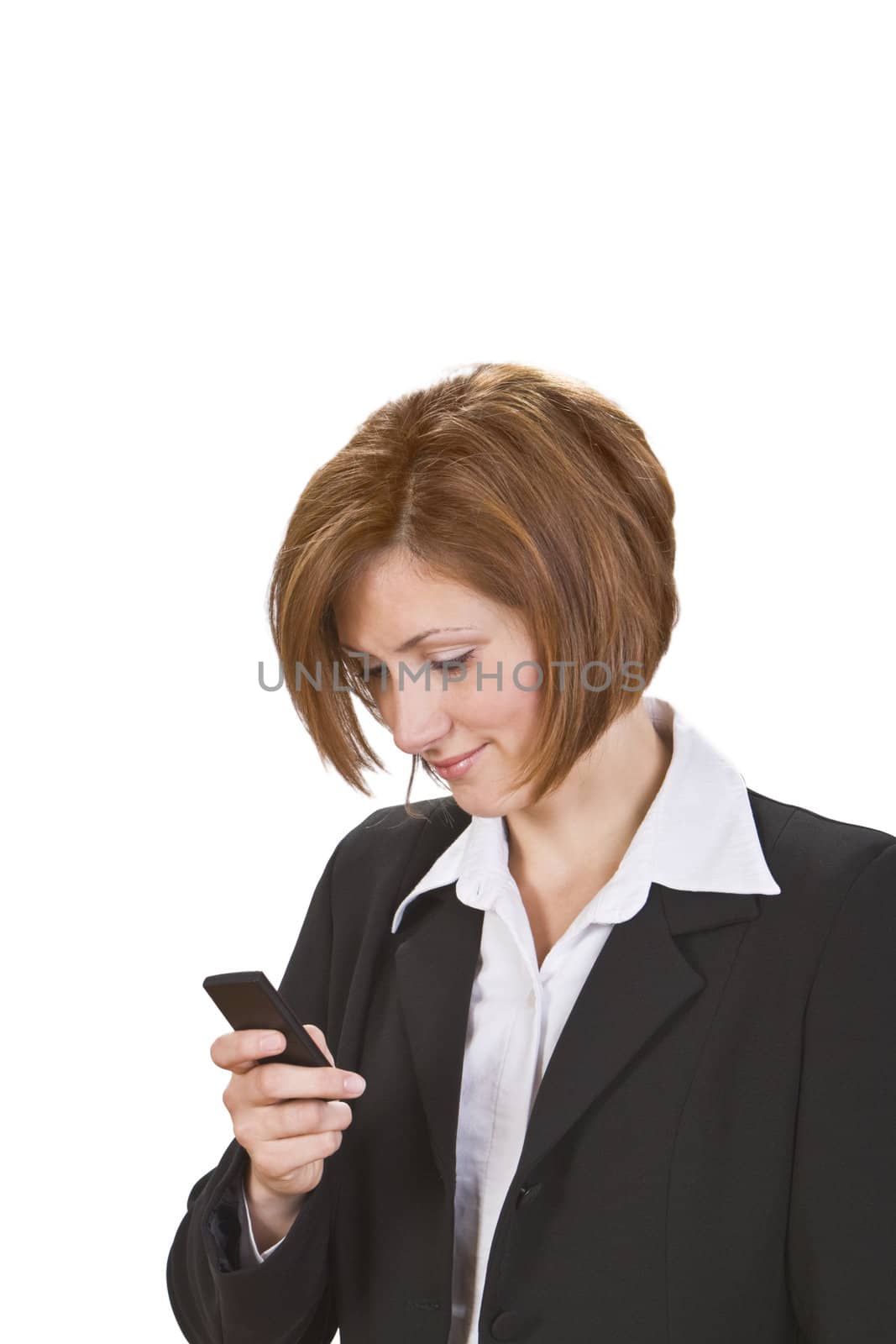 Young businesswoman checking her mobile phone.