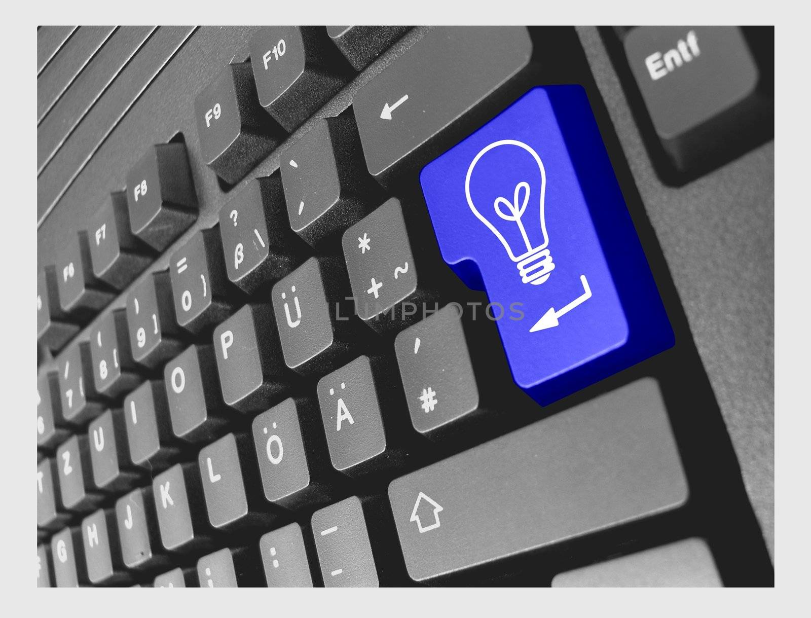 keyboard with blue key bulb - idea