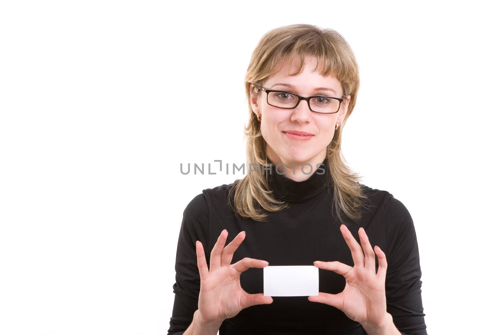 smiling girl in glasses holds a white card