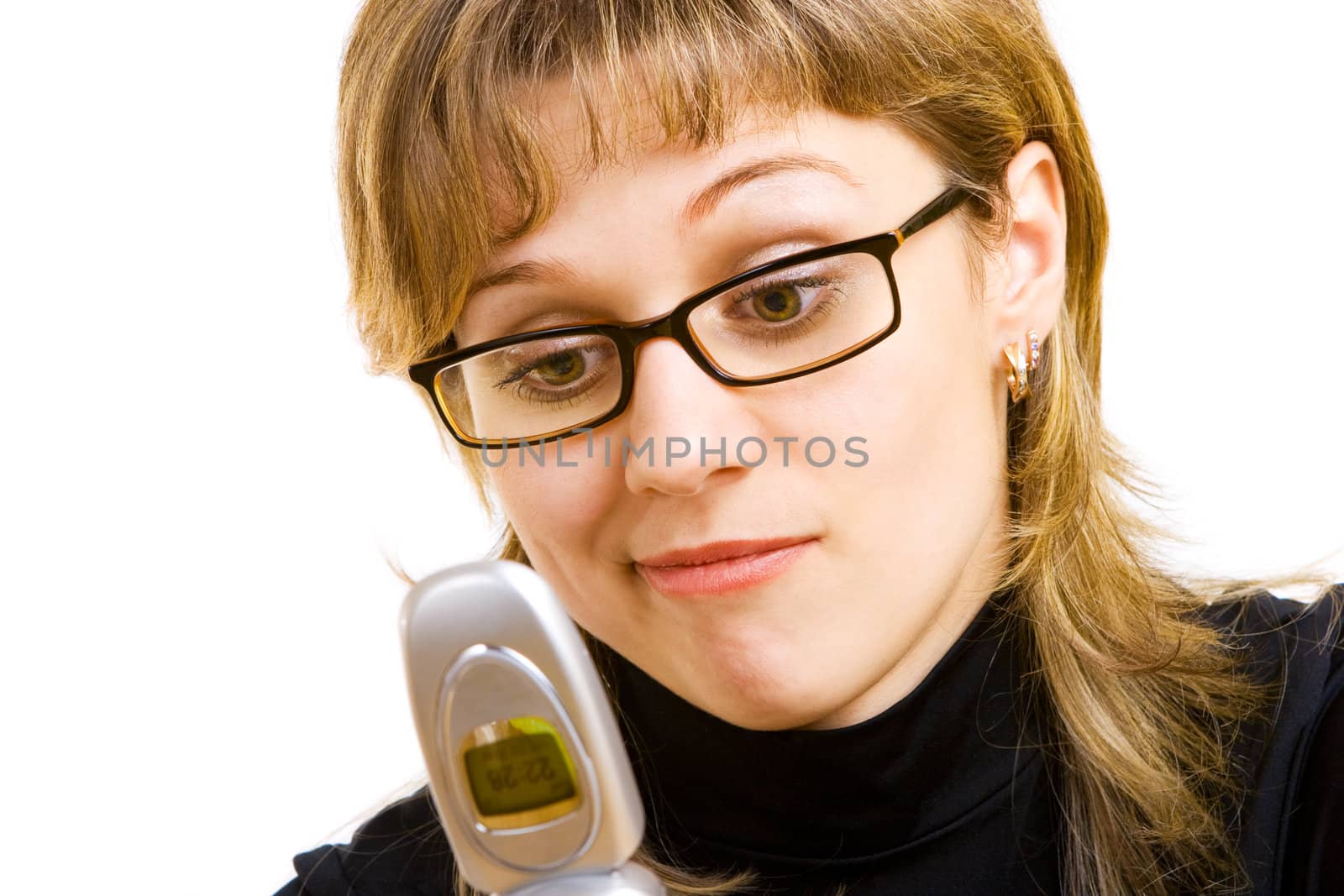 girl in glasses looking at the phone