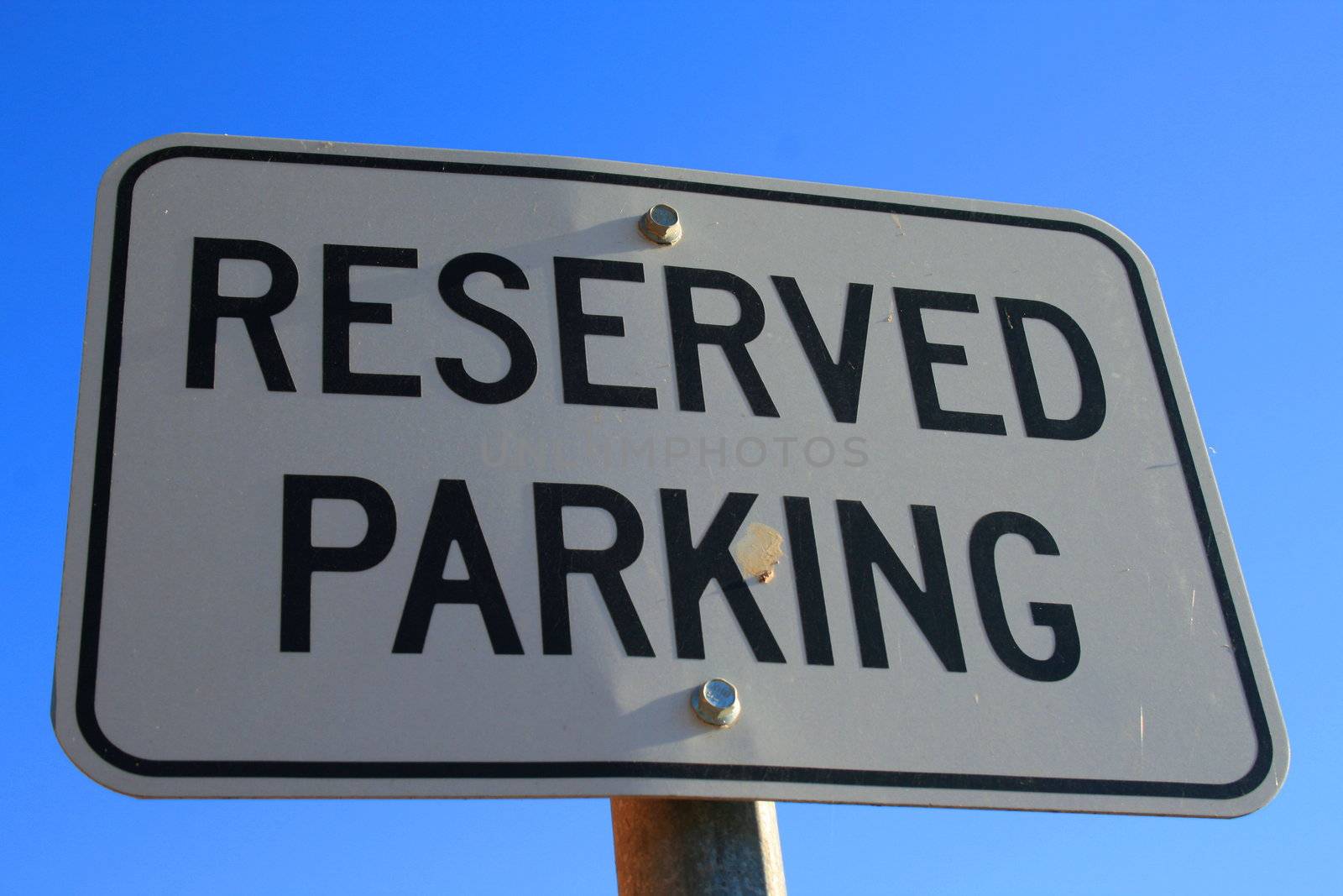 Reserved parking road sign close up.
