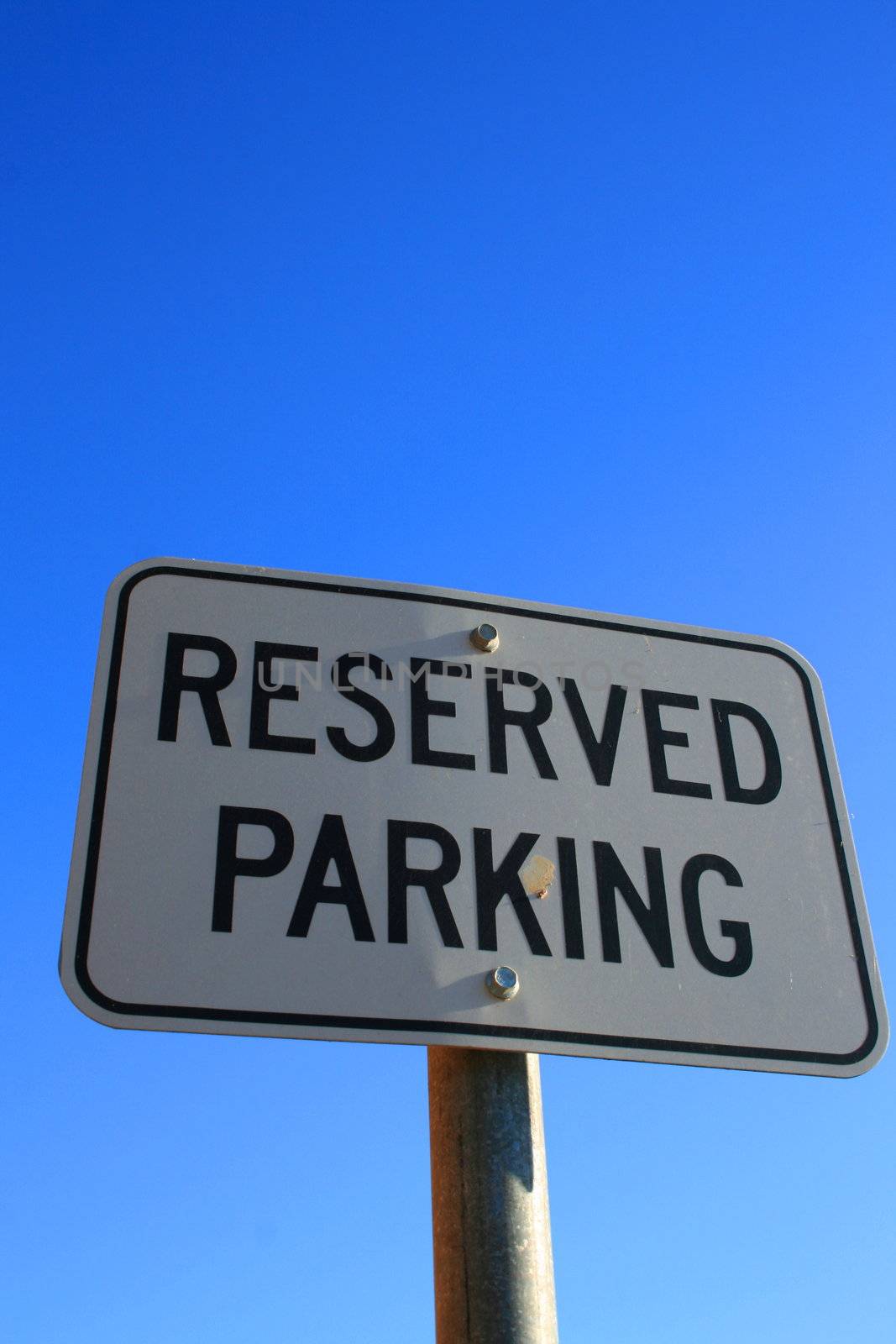 Reserved parking road sign close up.
