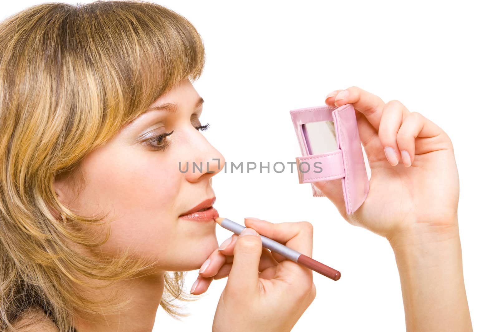 girl painting her lips