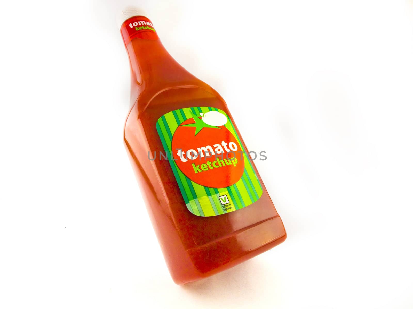 Large Bottle of Tomato Ketchup on White Background by bobbigmac