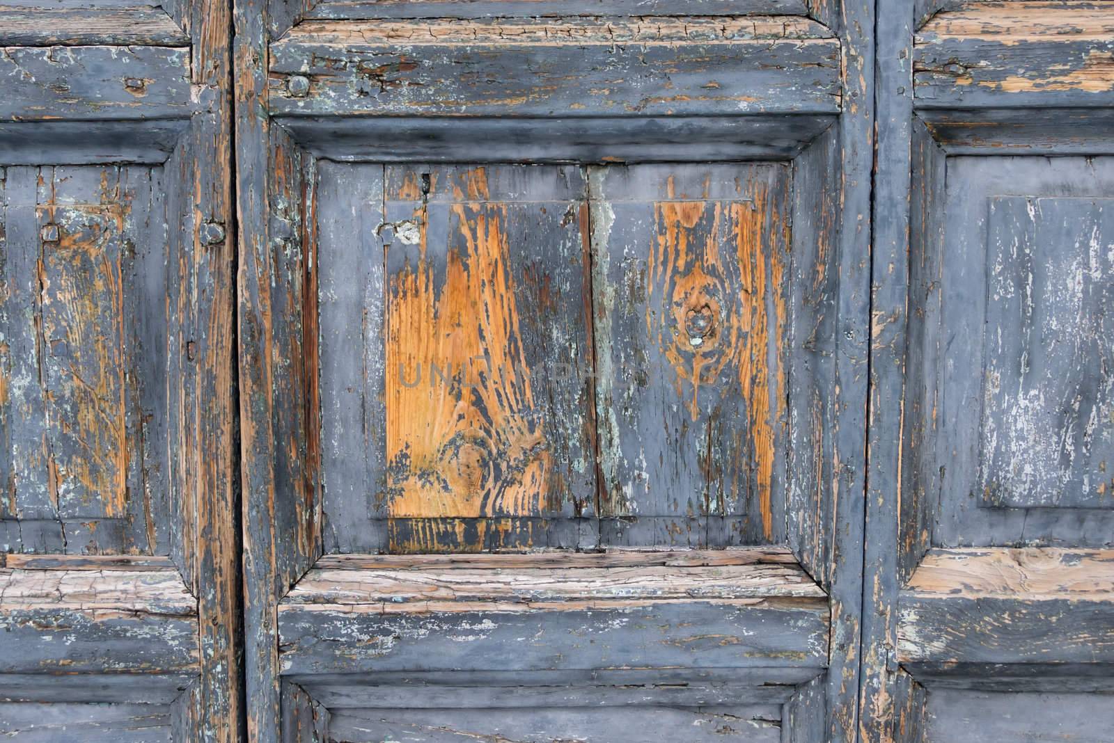 Wooden Old door with blue paint