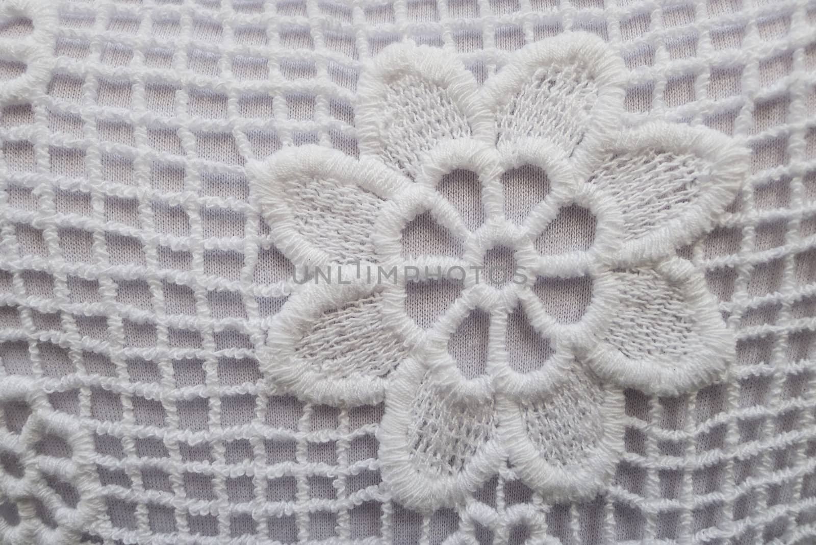 Detail of a white cotton lace