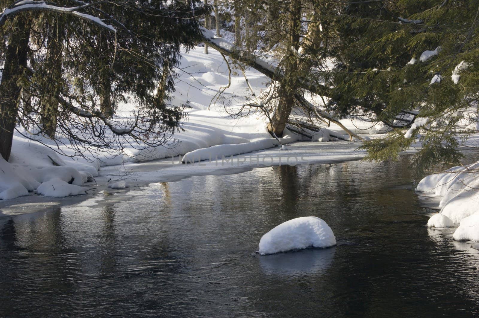 Snowy creek with snow bumps