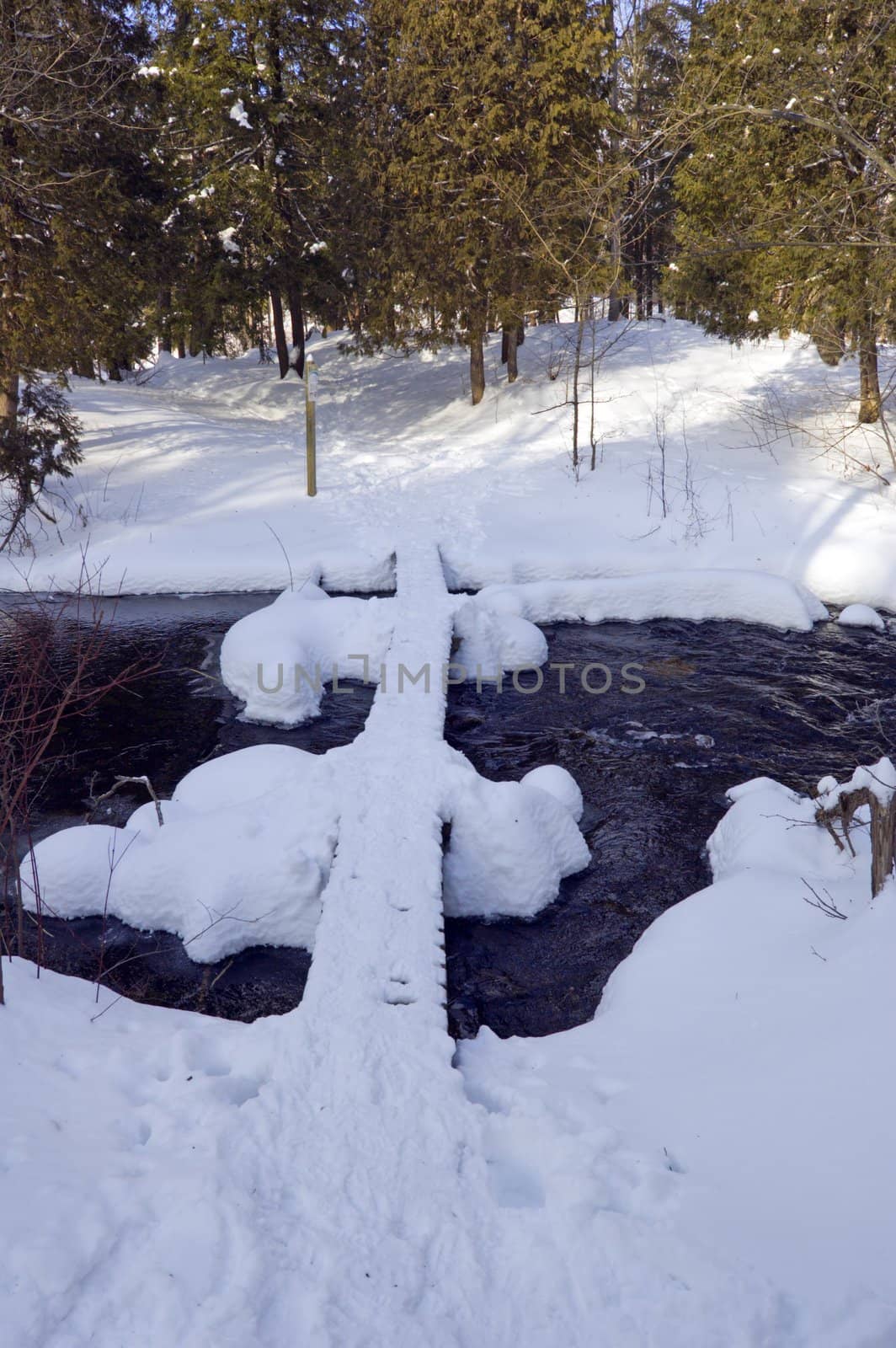 Snowy creek with snow bumps