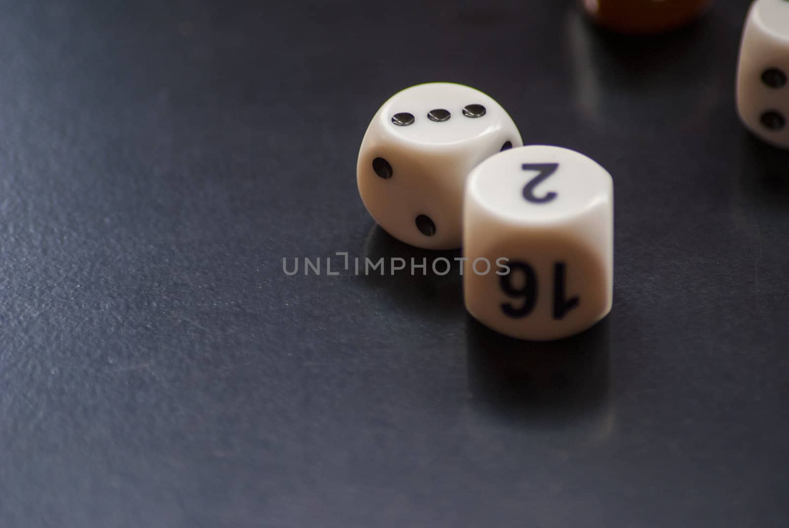 Two white dices by photografmts