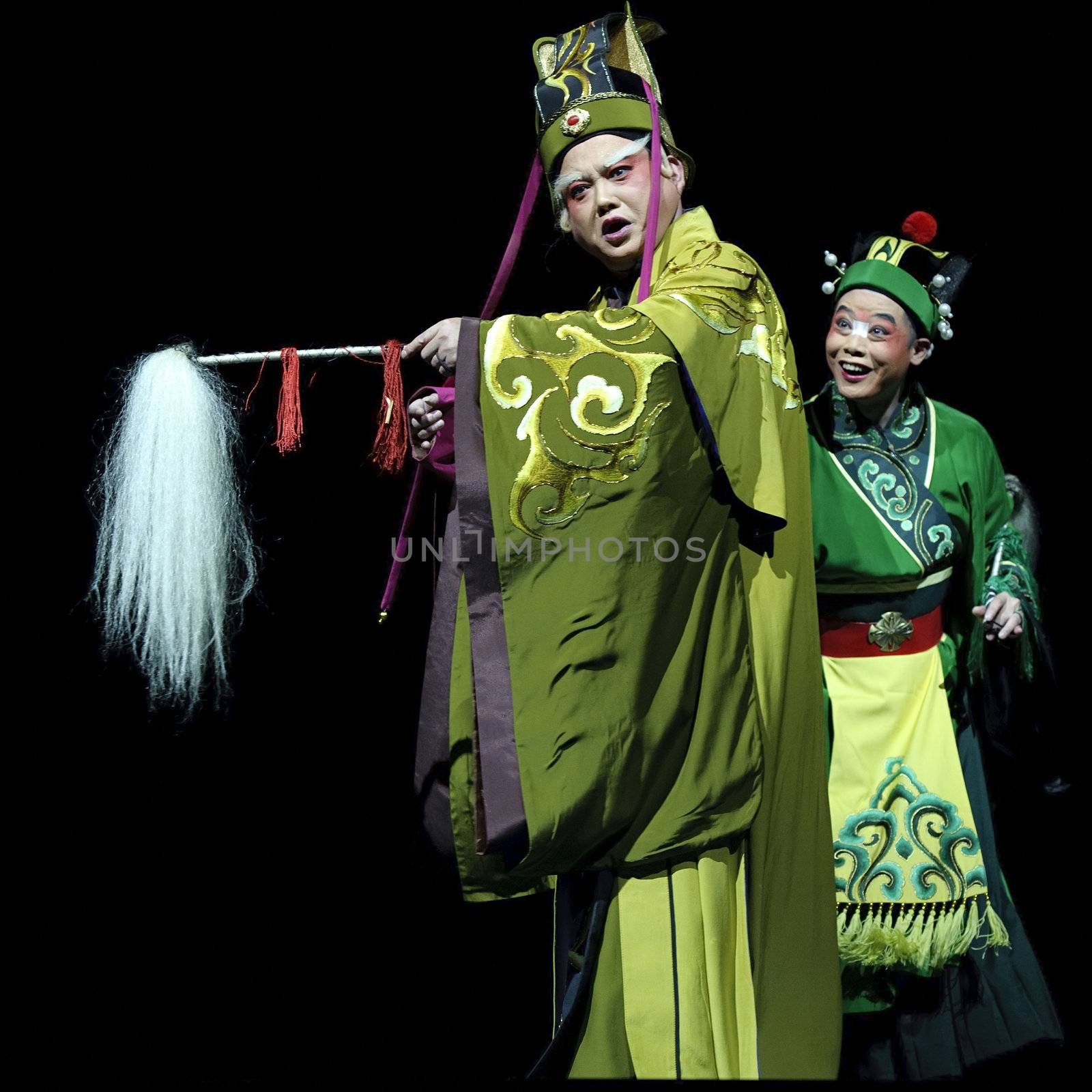 CHENGDU - JUN 6: Chinese Gaojia Opera performer make a show on stage to compete for awards in 25th Chinese Drama Plum Blossom Award competition at Jinsha theater.Jun 6, 2011 in Chengdu, China.
Chinese Drama Plum Blossom Award is the highest theatrical award in China.