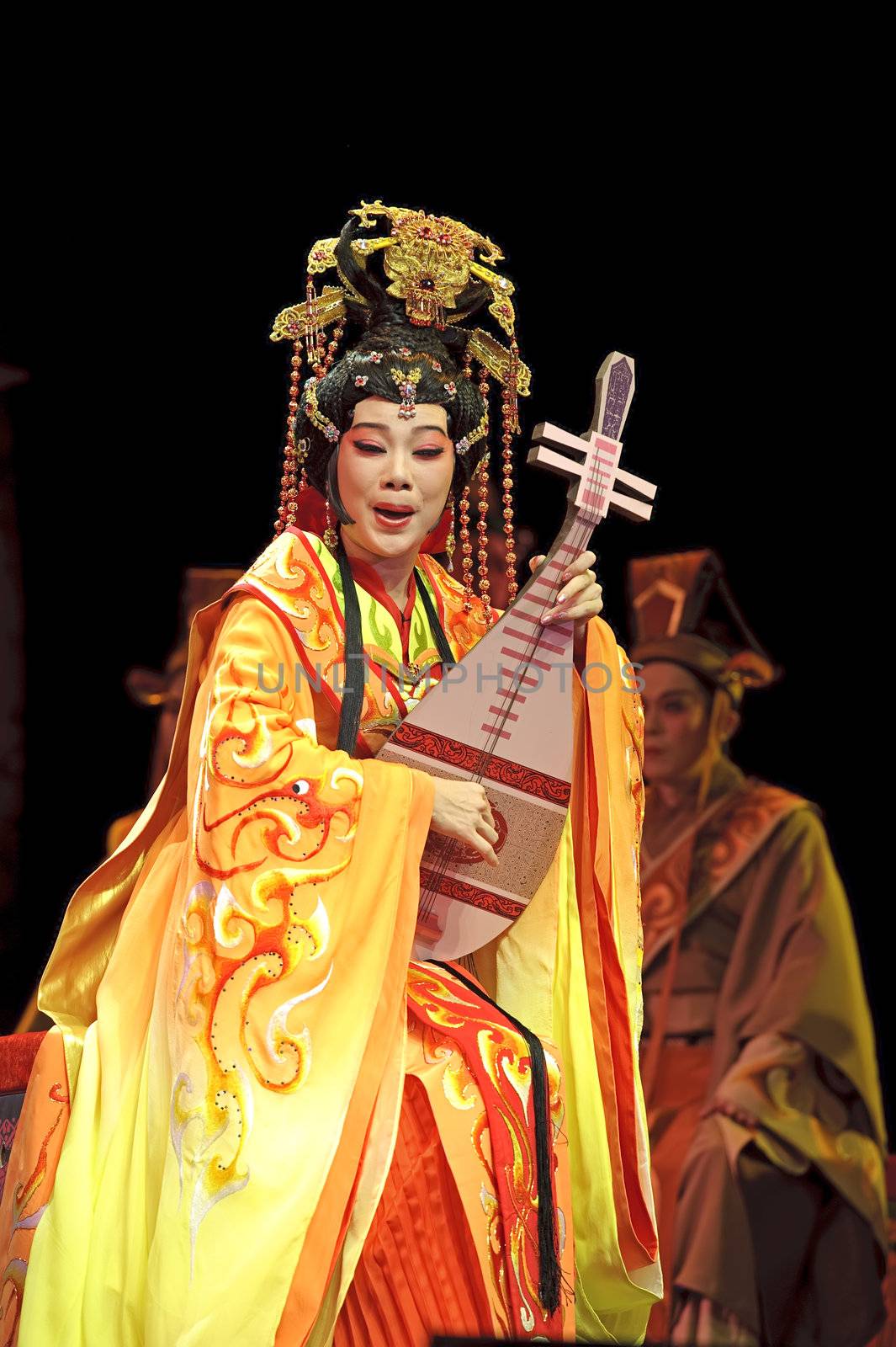 CHENGDU - JUN 6: Chinese Gaojia Opera performer make a show on stage to compete for awards in 25th Chinese Drama Plum Blossom Award competition at Jinsha theater.Jun 6, 2011 in Chengdu, China.
Chinese Drama Plum Blossom Award is the highest theatrical award in China.