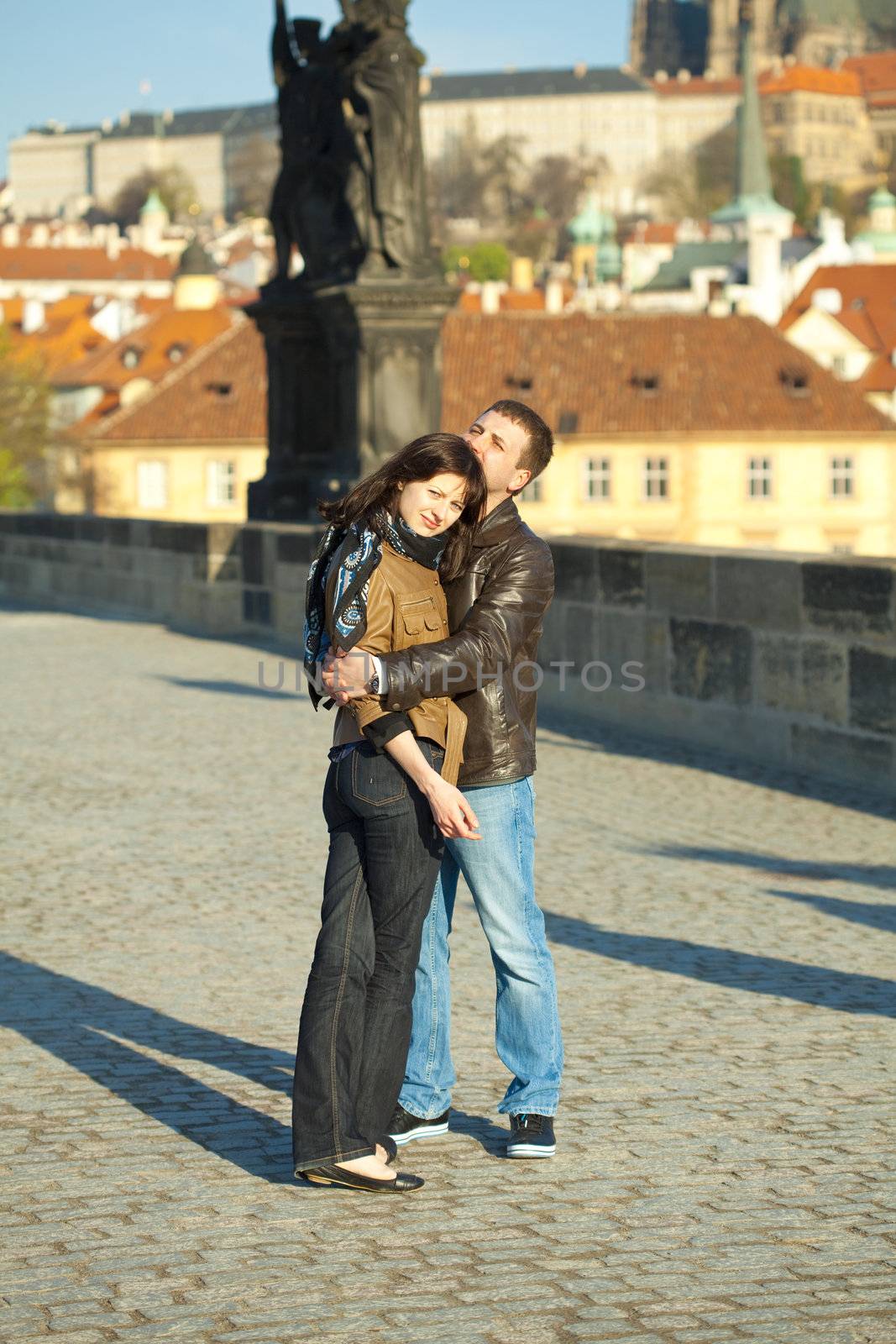 Young couple on the Charles Bridge by jannyjus