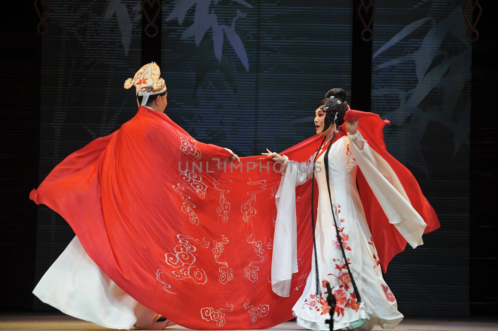 CHENGDU - JUN 4: chinese Sichuan opera performer make a show on stage to compete for awards in 25th Chinese Drama Plum Blossom Award competition at Xinan theater.Jun 4, 2011 in Chengdu, China.
Chinese Drama Plum Blossom Award is the highest theatrical award in China.