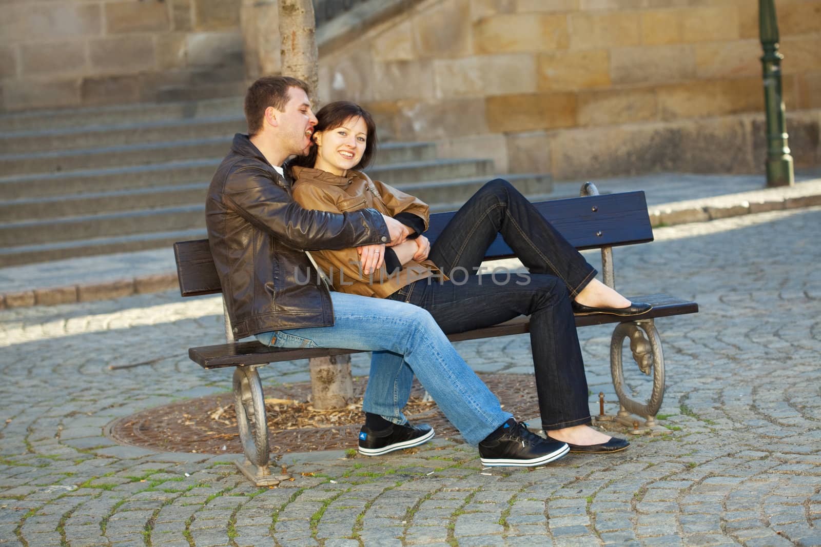love couple sitting on the bench