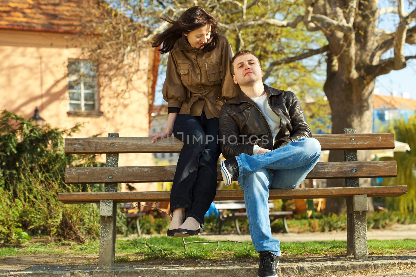 love couple sitting on a bench