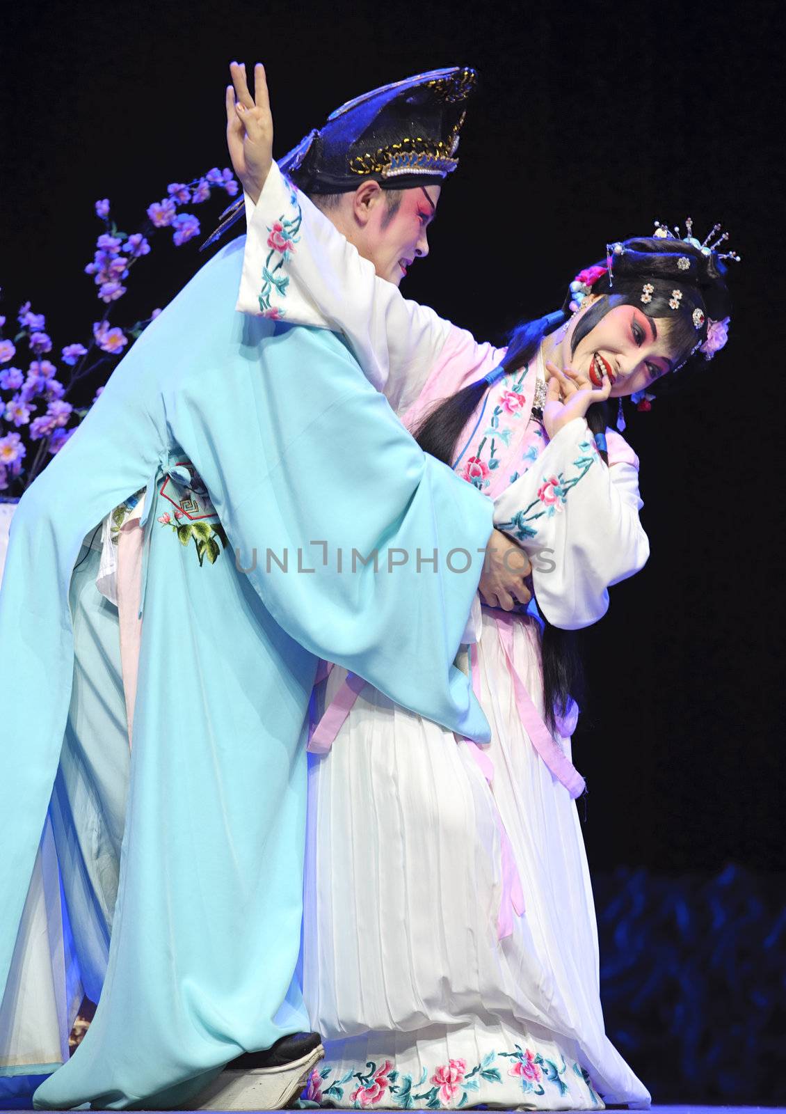 pretty chinese traditional opera actress with theatrical costume