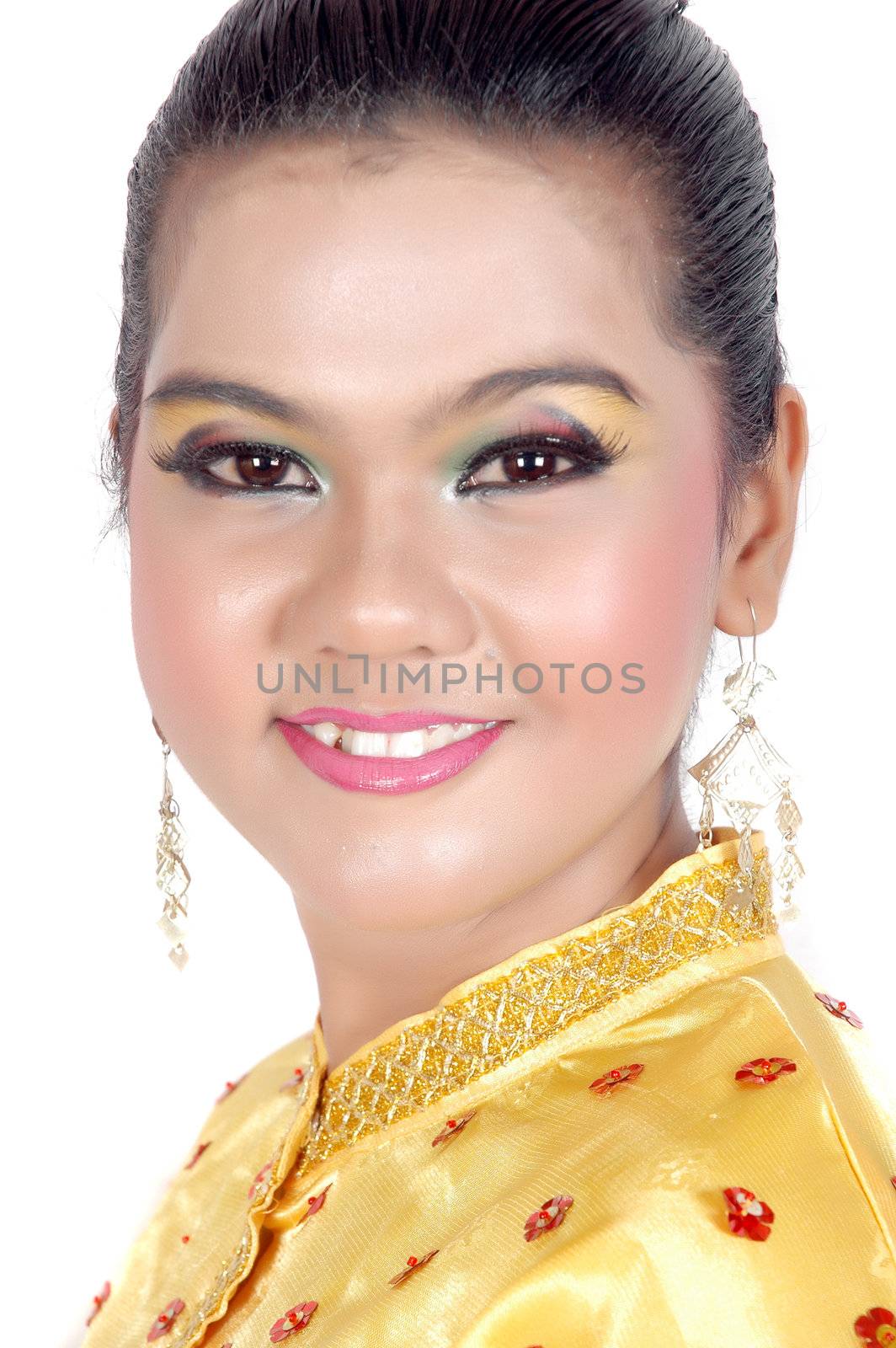 portrait of an asian young girl dressed in traditional indigenous tribal borneo isolated on white background