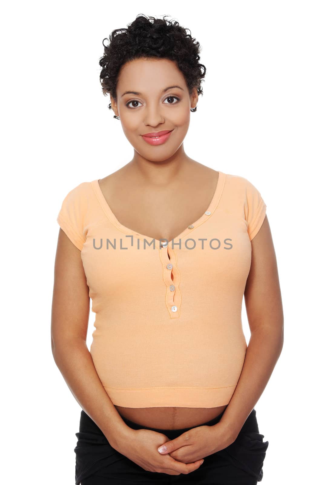 Pregnant woman smiling to the camera. by BDS