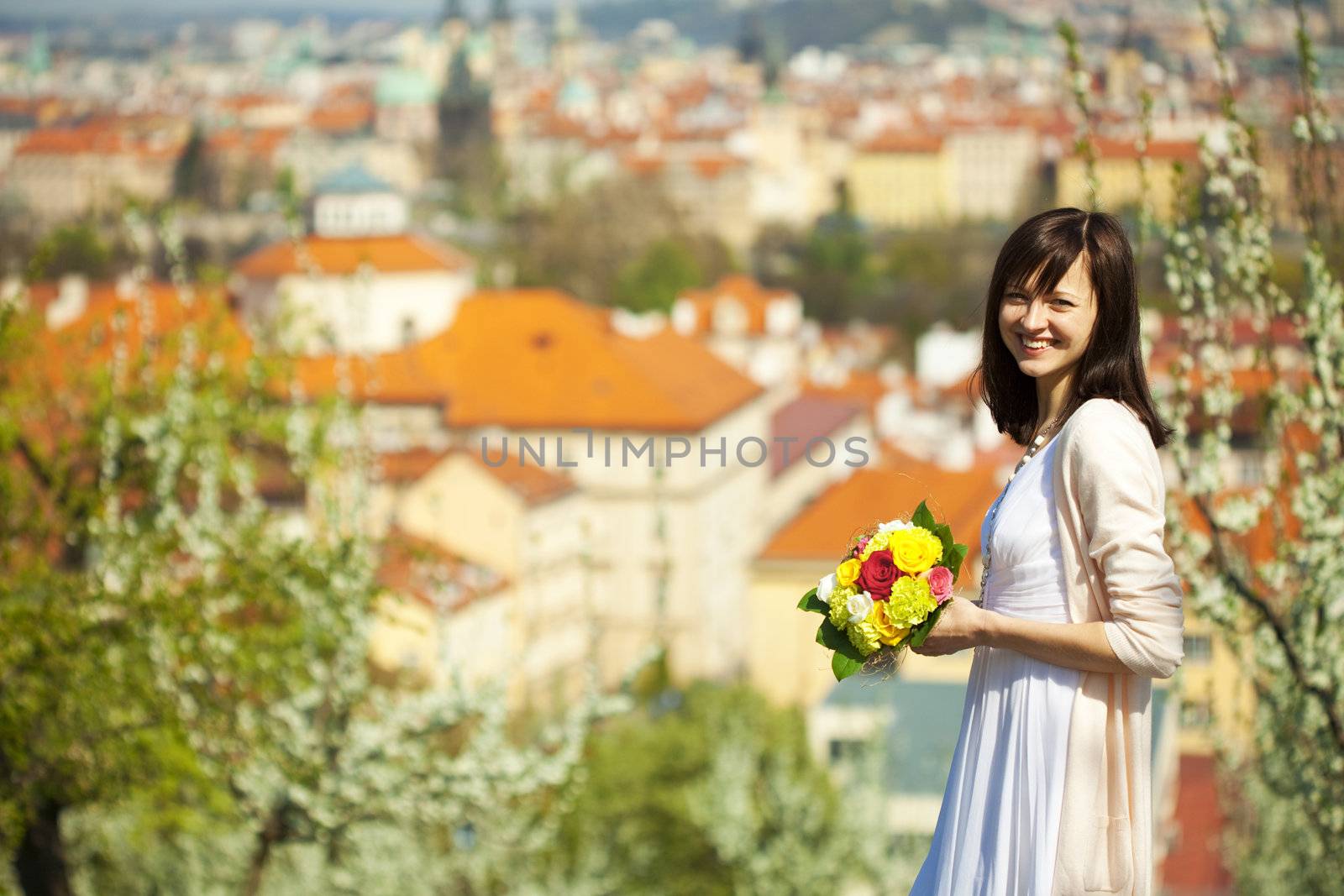 beautiful young bride on the background of Prague
